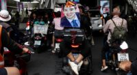 An illustration in the likeness of Move Forward Party leader Pita Limjaroenrat on a protesters motorbike during a rally in support of Move Forward Party, Bangkok, Thailand, 2 August 2023 (Photo: Reuters/Valeria Mongelli)