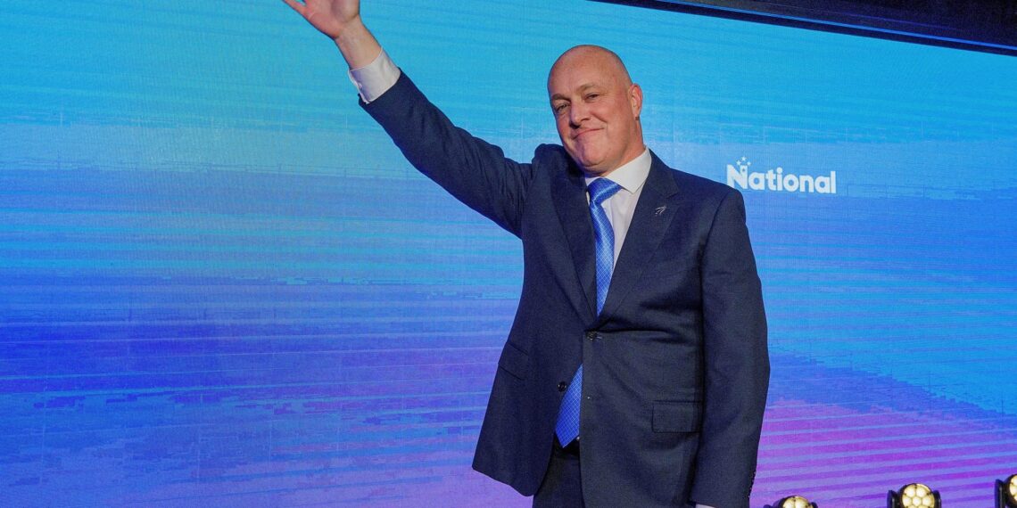 New Zealander Prime Minister Christopher Luxon waves to supporters at his election party after winning the general election in Auckland, New Zealand, 14 October 2023 (Photo: David Rowland/File Photo via Reuters).