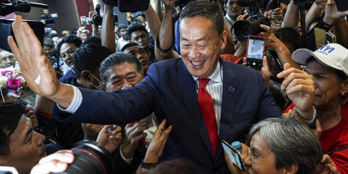 Thailand's newly elected Prime Minister Srettha Thavisin greets supporters after winning the parliamentary vote to become next prime minister, at Pheu Thai Party's headquarters in Bangkok, Thailand, 22 August 2023 (Photo: Reuters/Anusak Laowilas).