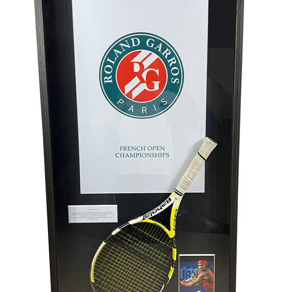 Rafael Nadal's championship point winning racket from his 2007 French Open Final victory over Roger Federer, in custom framing. The racket comes with a Resolution Photomatch document, forensically confirming it was the very racket which won the final point.