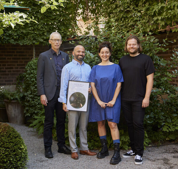 Winner of the Food Planet Prize 2024: C40 Food Systems. Zachary Tofias, Director of Food and Waste, and Stefania Amato, Head of Food Strategy at C40 Cities Climate Leadership Group, posing with the winner